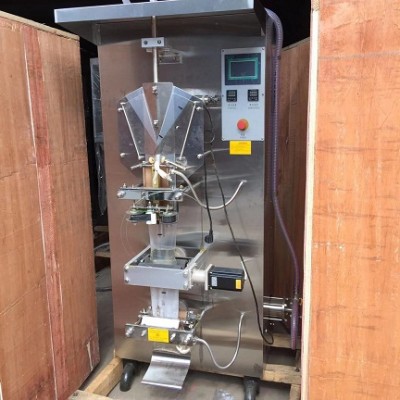 Milk filling and sealing machine